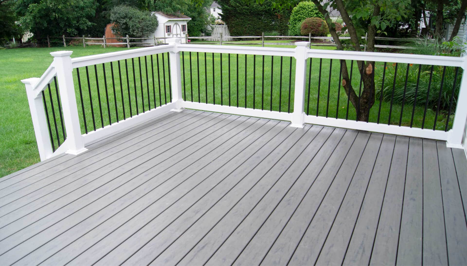 Transform Your Lowa City, IA Deck with Our Deck Builders' Beautiful Railing and Covers